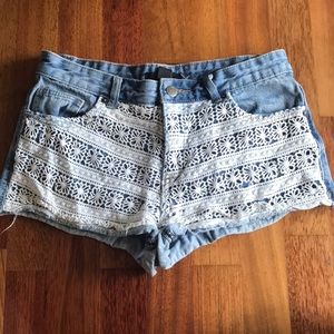 Light blue washed colored jean shorts